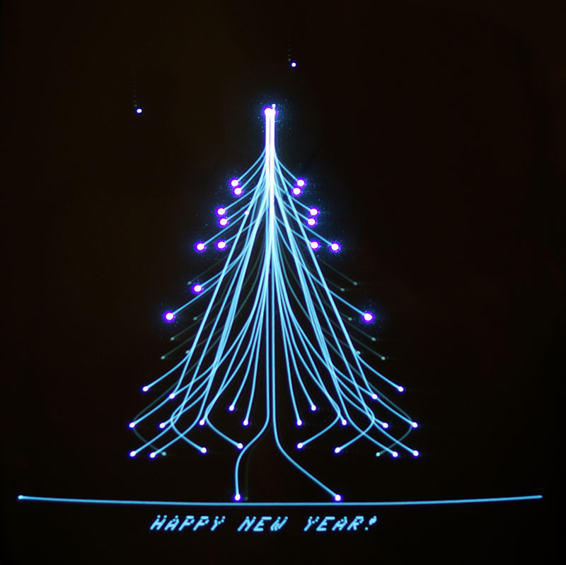 Кадр из 1кб интро Christmas tree goes to a party для Vectrex by Frog